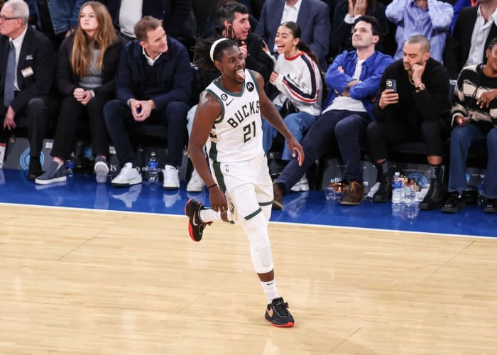 Milwaukee Bucks guard Jrue Holiday (21) celebrates a basket